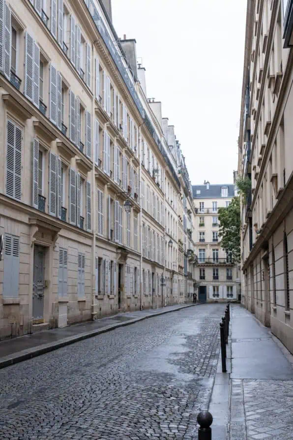 Saint Germain des Prés quiet side street soaked in rain.
